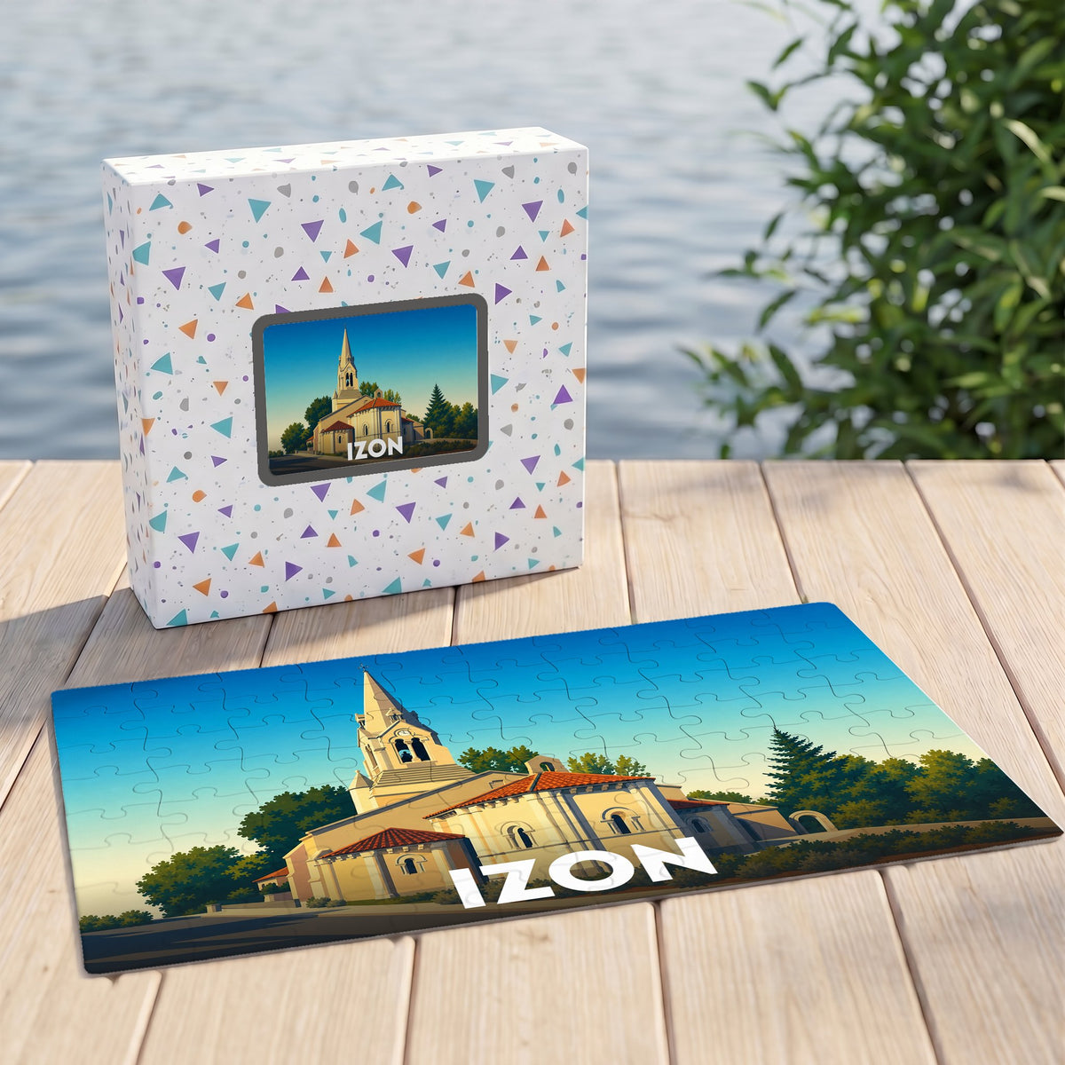 Puzzle souvenir de la ville d'Izon avec une illustration stylisée d'une église locale.