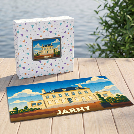 Puzzle souvenir de la ville de Jarny illustré d'un manoir stylisé sous un ciel bleu.