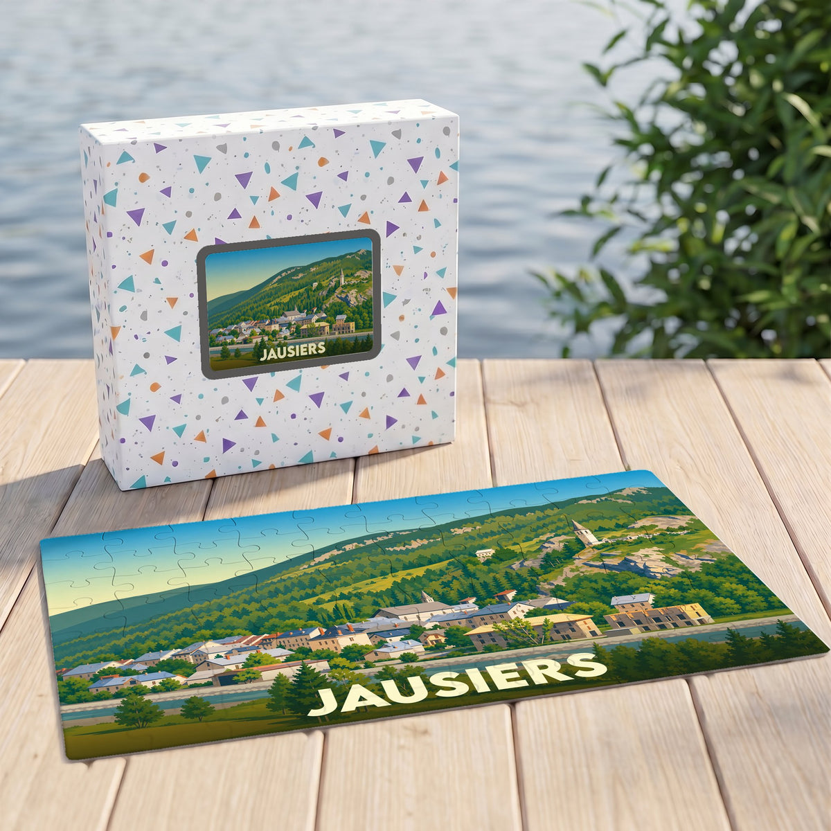 Puzzle souvenir de la ville de Jausiers illustrant un paysage montagneux stylisé.