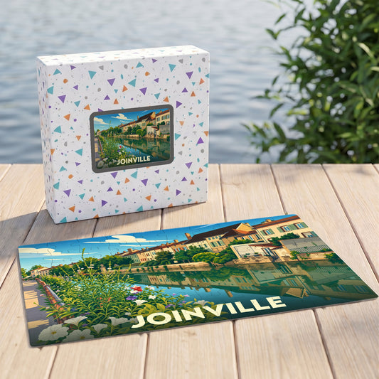 Puzzle souvenir de la ville de Joinville avec une illustration stylisée d'un paysage urbain au bord de l'eau.
