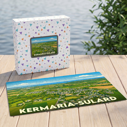 Puzzle souvenir de la ville de Kermaria-Sulard avec une illustration de paysage champêtre vue du ciel.