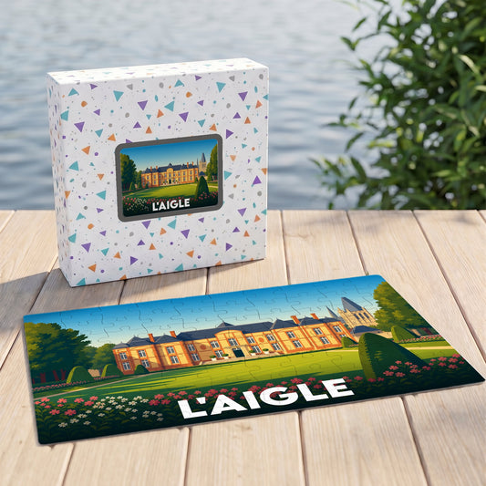 Puzzle souvenir de la ville de L'Aigle avec une illustration stylisée de son château et de ses jardins.