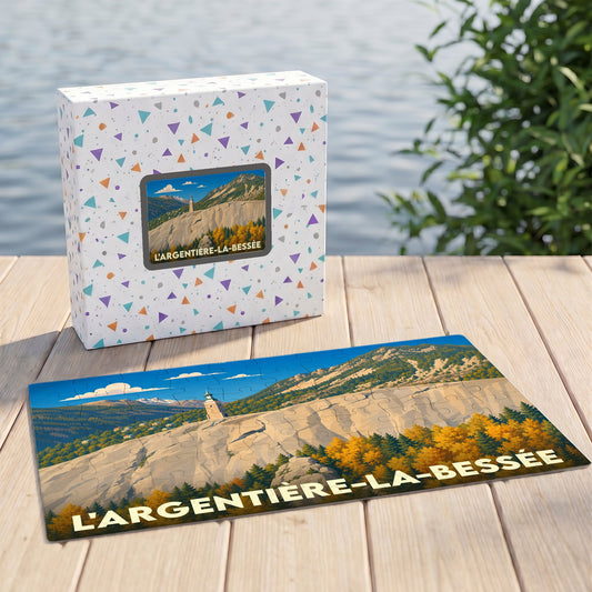 Puzzle souvenir de la ville de L'Argentière-la-Bessée avec une illustration de paysage montagneux stylisée.