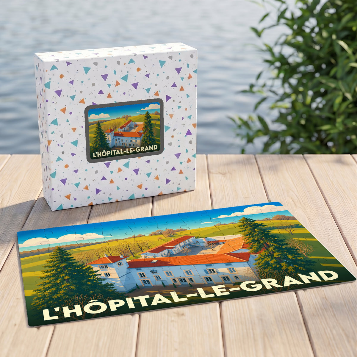 Puzzle souvenir de la ville de L'Hôpital-le-Grand avec une illustration stylisée de son paysage et de ses bâtiments.