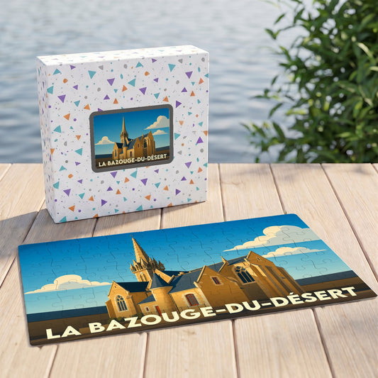 Puzzle souvenir de la ville de La Bazouge-du-Désert avec une illustration stylisée d'une église.
