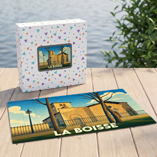 Puzzle souvenir de la ville de La Boisse avec une illustration stylisée de son église.