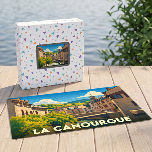 Puzzle souvenir de la ville de La Canourgue avec une illustration stylisée d'un paysage urbain pittoresque.
