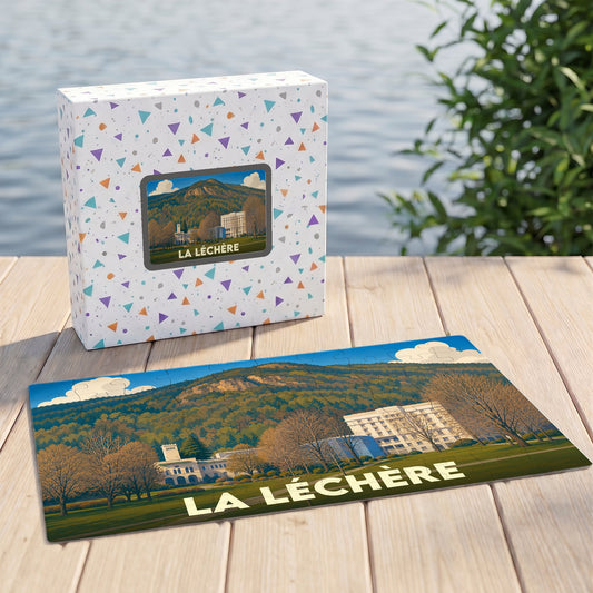 Puzzle souvenir de la ville de La Léchère avec une illustration stylisée de son paysage thermal.
