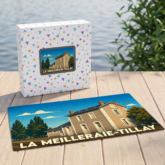 Puzzle souvenir de la ville de La Meilleraie-Tillay avec son emballage et une illustration stylisée d'un bâtiment local.