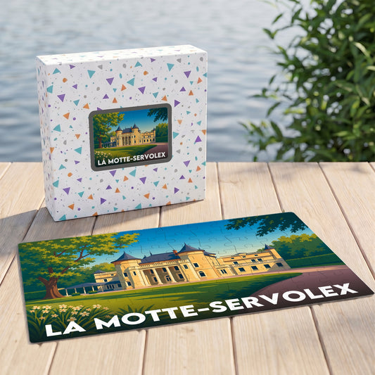 Puzzle souvenir de la ville de La Motte-Servolex avec une illustration stylisée d'un château.