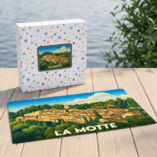 Puzzle souvenir de la ville de La Motte avec une illustration stylisée d'un village provençal.