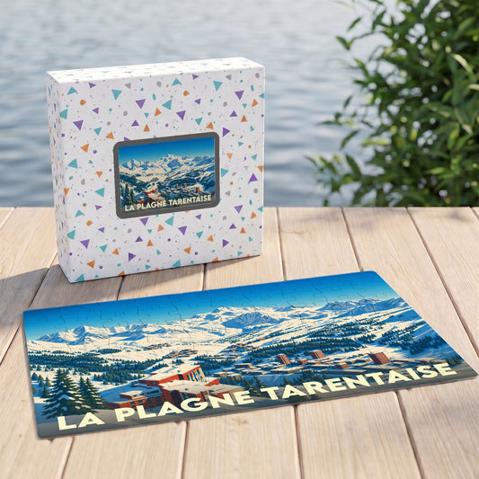 Puzzle souvenir de La Plagne Tarentaise avec une illustration de paysage de montagne enneigé.
