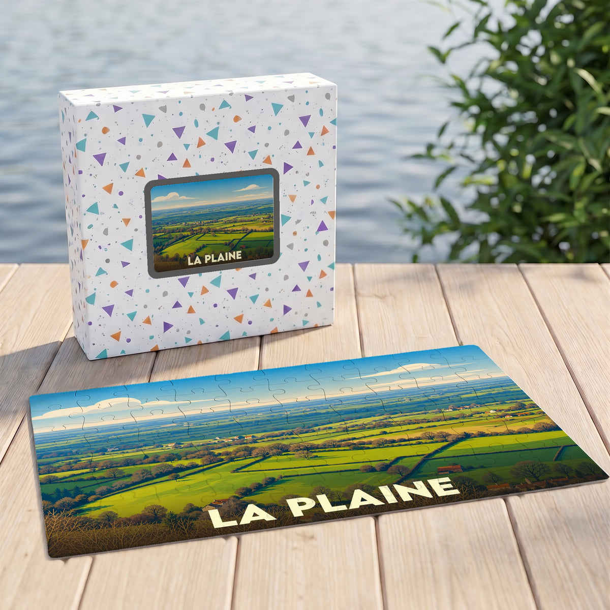 Puzzle souvenir de la ville de La Plaine avec une illustration de paysages verdoyants.