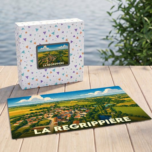 Puzzle souvenir de la ville de La Regrippière avec une illustration stylisée d'un paysage champêtre.