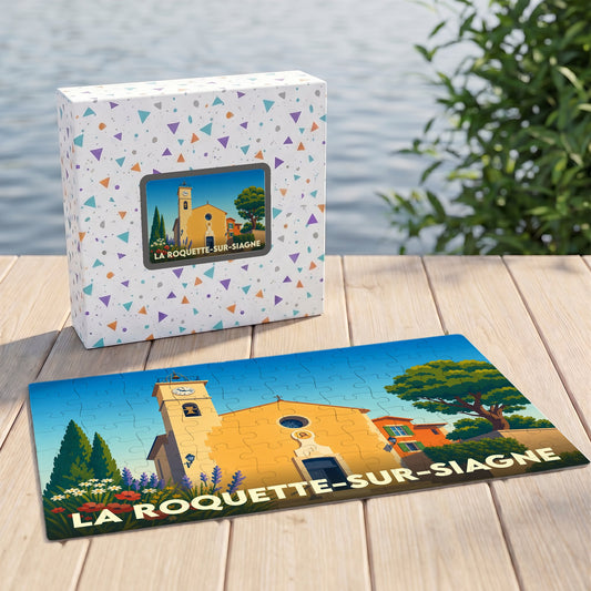Puzzle souvenir de la ville de La Roquette-sur-Siagne avec une illustration stylisée de son église et de son clocher.