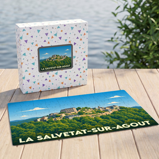 Puzzle souvenir de la ville de La Salvetat-sur-Agout avec une illustration paysagère stylisée.
