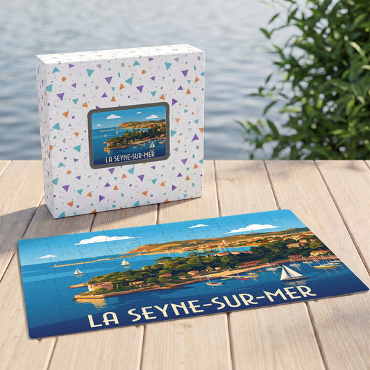 Puzzle souvenir de la ville de La Seyne-sur-Mer avec une illustration stylisée de son littoral et de ses voiliers.
