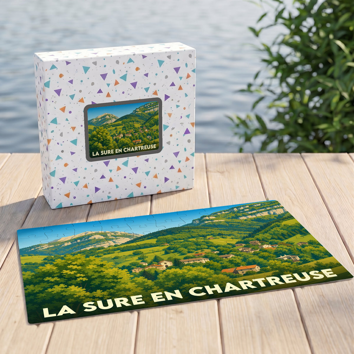 Puzzle souvenir de la ville de La Sure en Chartreuse avec une illustration de paysage montagneux.