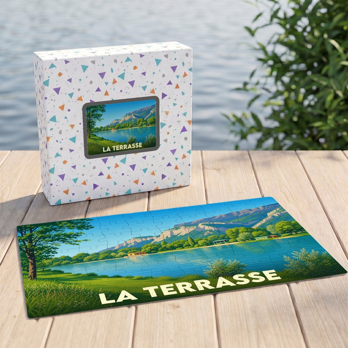 Puzzle souvenir de la ville de La Terrasse avec une illustration de son paysage lacustre.