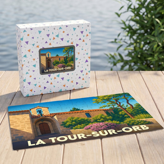 Puzzle souvenir de la ville de La Tour-sur-Orb avec une illustration stylisée.