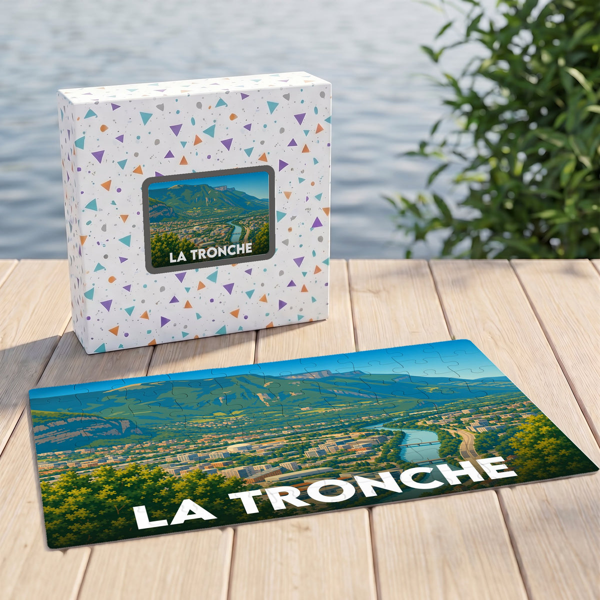 Puzzle souvenir de la ville de La Tronche avec une illustration panoramique stylisée.