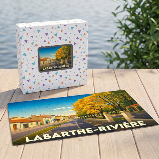 Puzzle souvenir de la ville de Labarthe-Rivière avec une illustration stylisée et colorée.