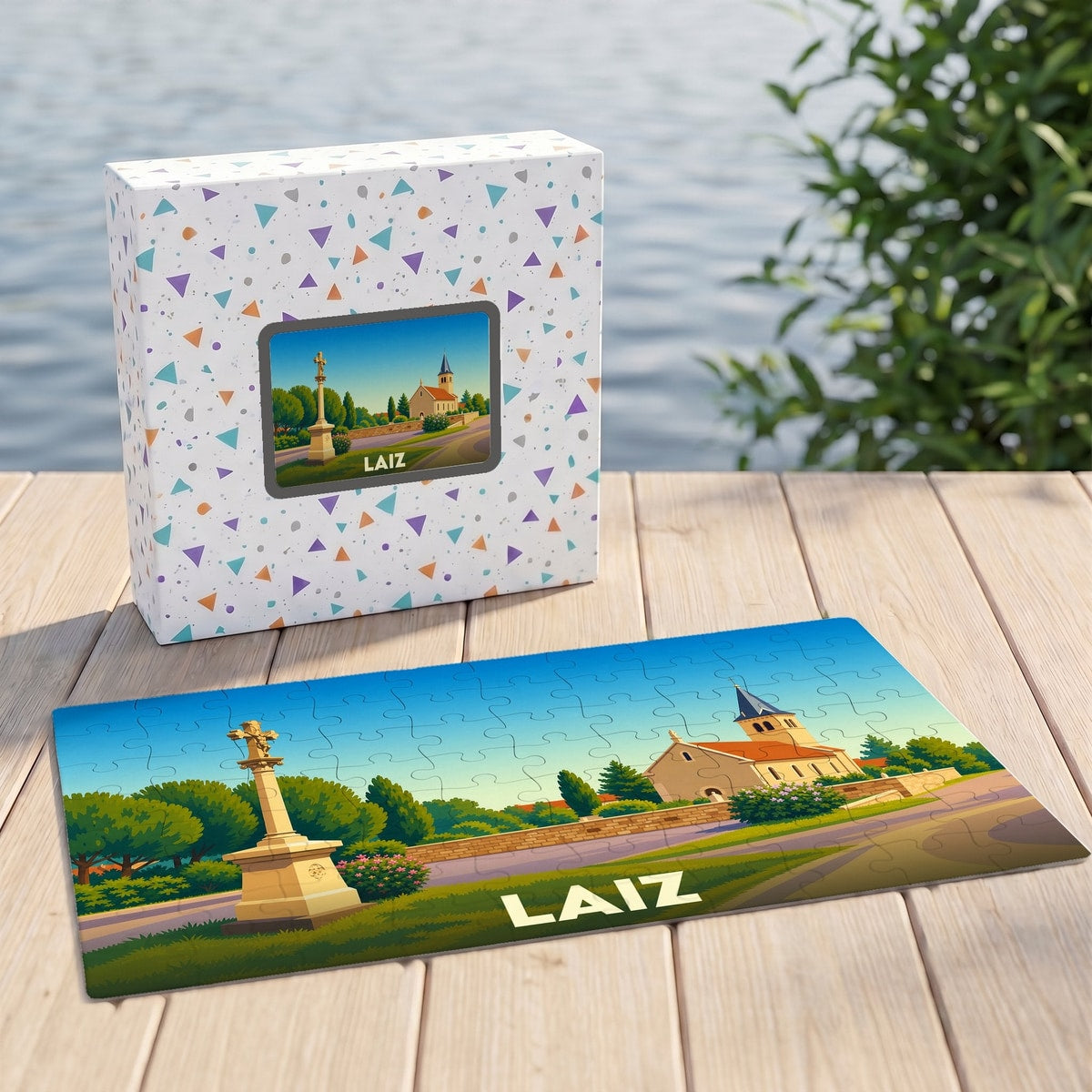 Puzzle souvenir de la ville de Laiz avec une illustration stylisée d'un monument et d'une église.