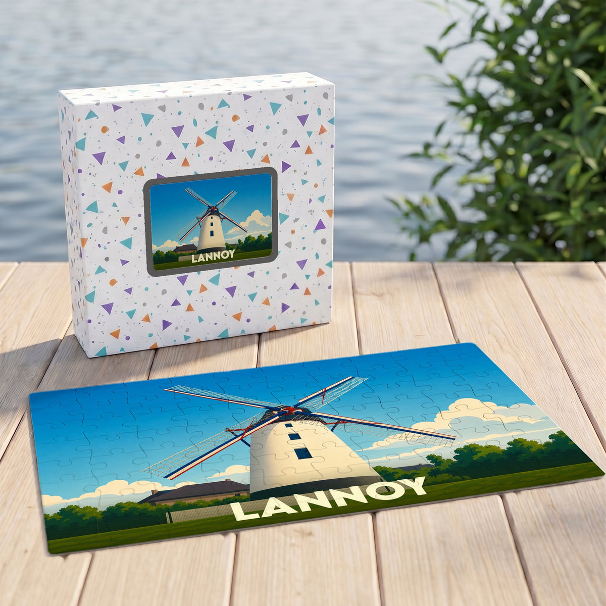 Puzzle souvenir de la ville de Lannoy illustrant un moulin blanc sous un ciel bleu.