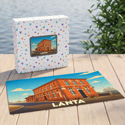 Puzzle souvenir de la ville de Lanta avec une illustration stylisée d'un bâtiment en briques rouges.