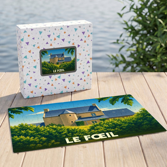 Puzzle souvenir de la commune de Le Fœil avec une illustration stylisée d'un manoir breton.