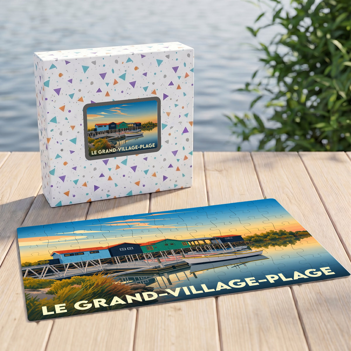 Puzzle souvenir de la commune de Le Grand-Village-Plage avec une illustration stylisée de cabanes de pêcheurs.