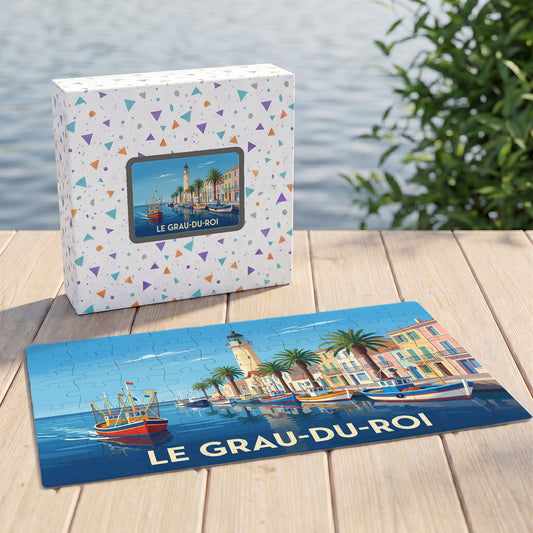 Puzzle souvenir de la ville de Le Grau-du-Roi avec une illustration stylisée d'un port méditerranéen.