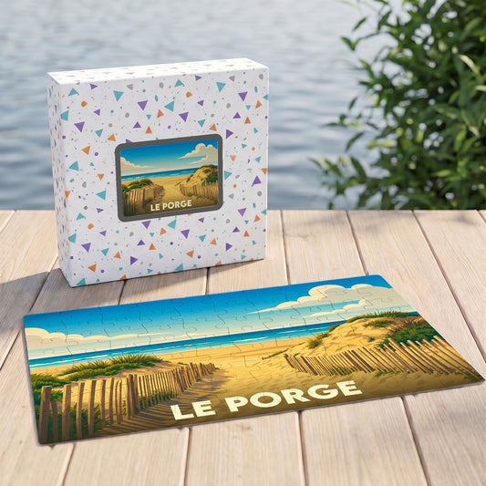 Puzzle souvenir de la ville de Le Porge illustrant un chemin traversant les dunes vers l'océan.