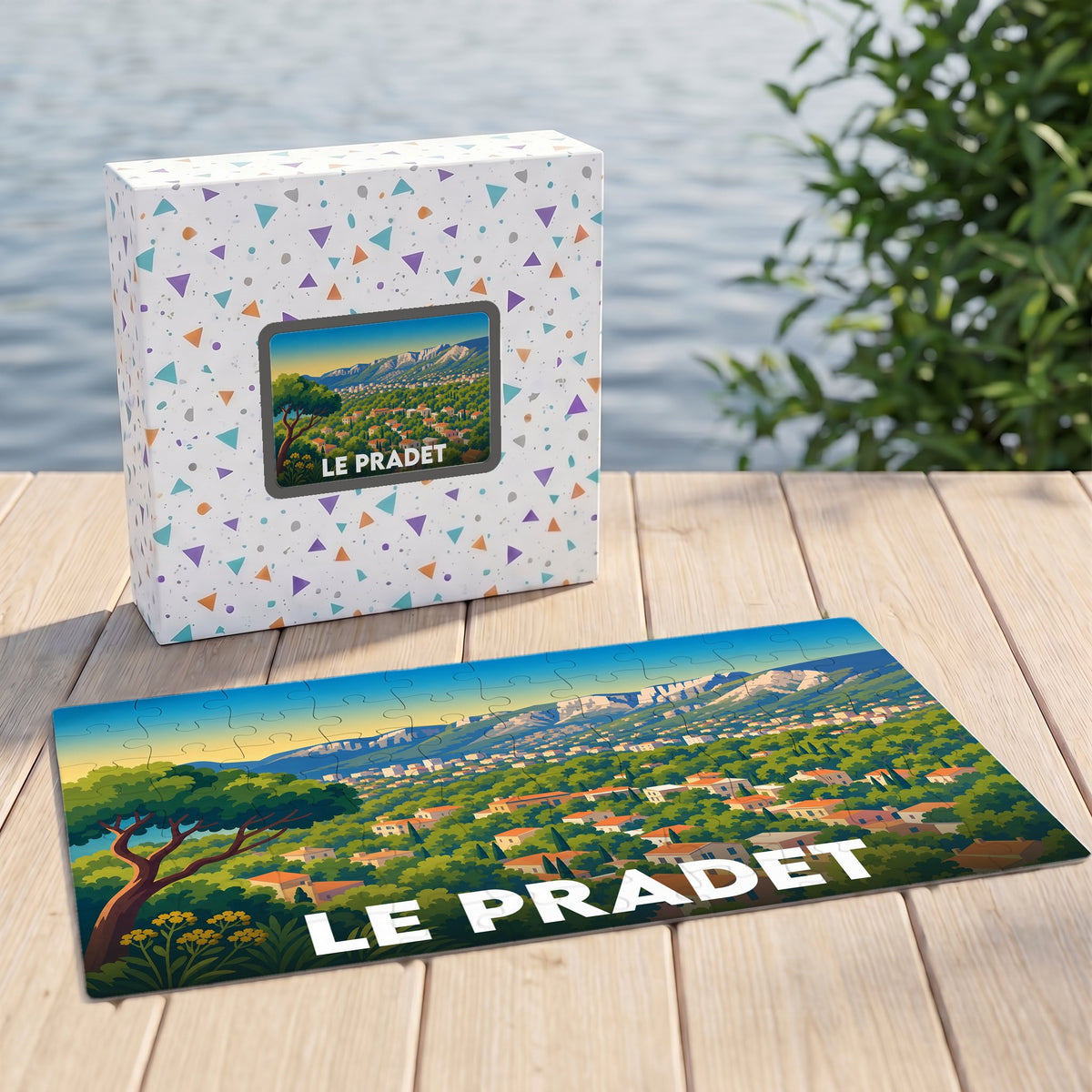 Puzzle souvenir de la ville de Le Pradet avec une illustration stylisée d'un paysage provençal.