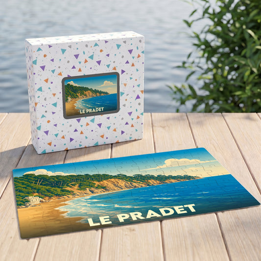 Puzzle souvenir de la ville de Le Pradet avec une illustration de plage ensoleillée et son coffret assorti.