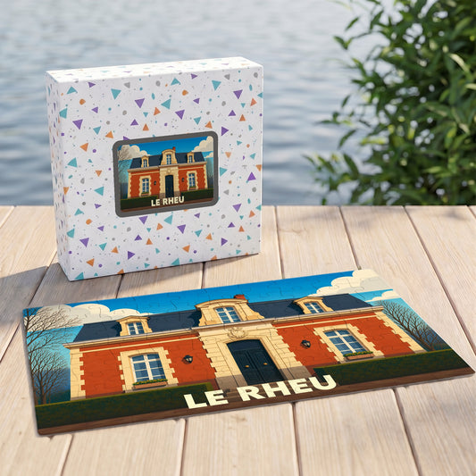 Puzzle souvenir de la ville du Rheu illustrant une demeure de caractère dans un style graphique épuré.