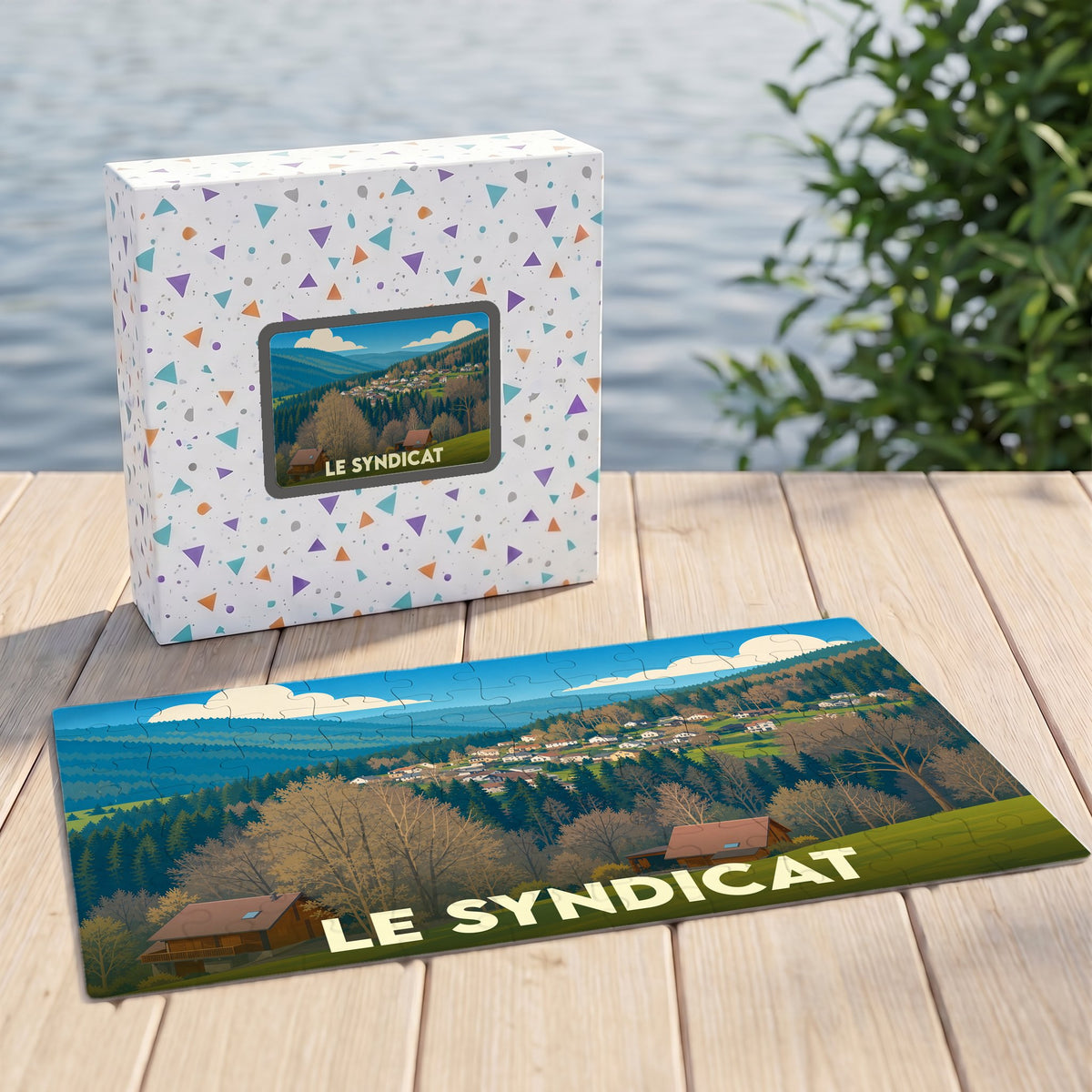 Puzzle souvenir de la ville de Le Syndicat représentant un paysage de montagne illustré.