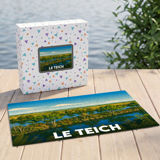 Puzzle souvenir de la ville de Le Teich avec une illustration paysagère stylisée.