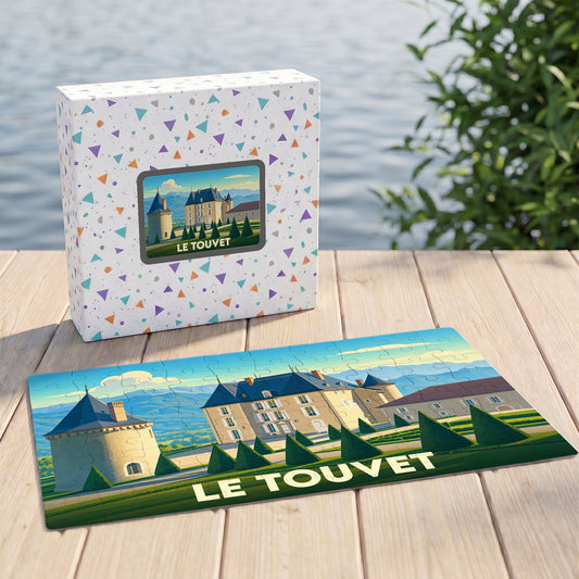 Puzzle souvenir de la ville de Le Touvet avec une illustration stylisée de son château.
