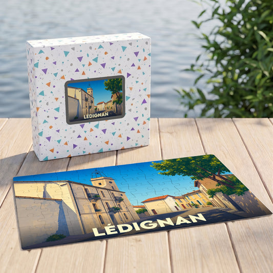 Puzzle souvenir de la ville de Lédignan avec une illustration stylisée et colorée.