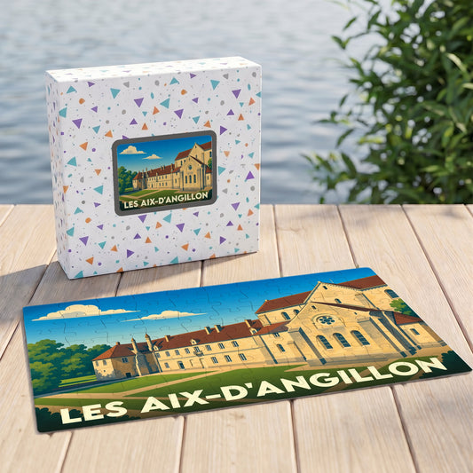 Puzzle souvenir de la ville des Aix-d'Angillon avec une illustration stylisée d'un bâtiment historique.