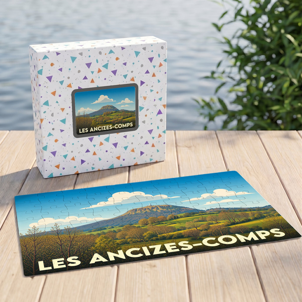Puzzle souvenir de la ville de Les Ancizes-Comps avec une illustration de paysage vallonné.