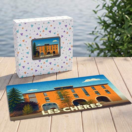 Puzzle souvenir de la ville de Les Chères avec une illustration stylisée d'un bâtiment orange.