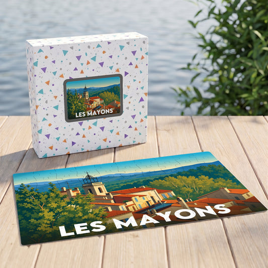 Puzzle souvenir de la ville de Les Mayons avec une illustration stylisée et colorée.