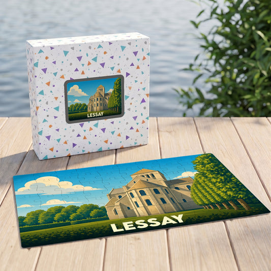Puzzle souvenir de la ville de Lessay avec une illustration stylisée d'une abbaye.