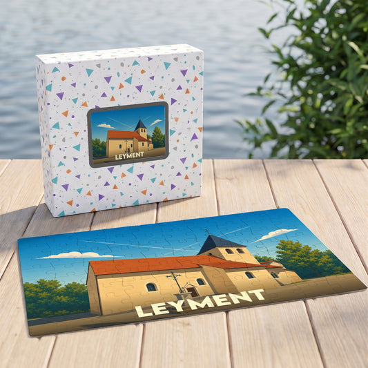 Puzzle souvenir de la ville de Leyment représentant une église sous un ciel bleu avec une illustration stylisée.