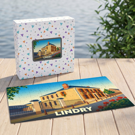 Puzzle souvenir de la ville de Lindry illustrant une grande demeure ensoleillée dans un style graphique épuré.