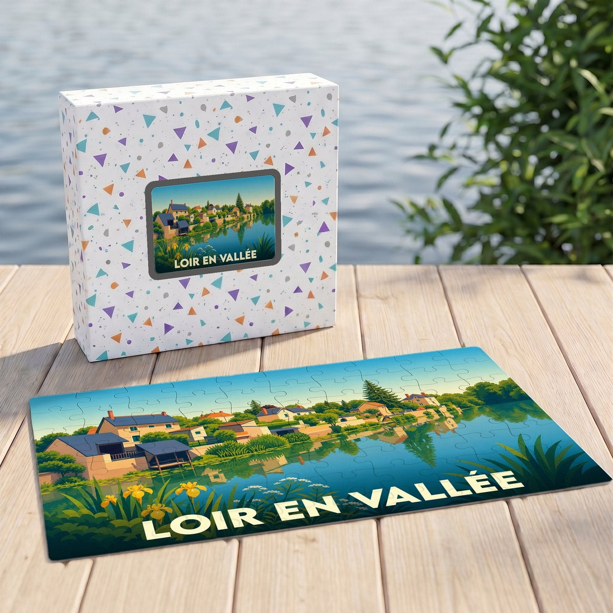 Puzzle souvenir de la ville de Loir en Vallée avec une illustration stylisée d'un paysage fluvial.