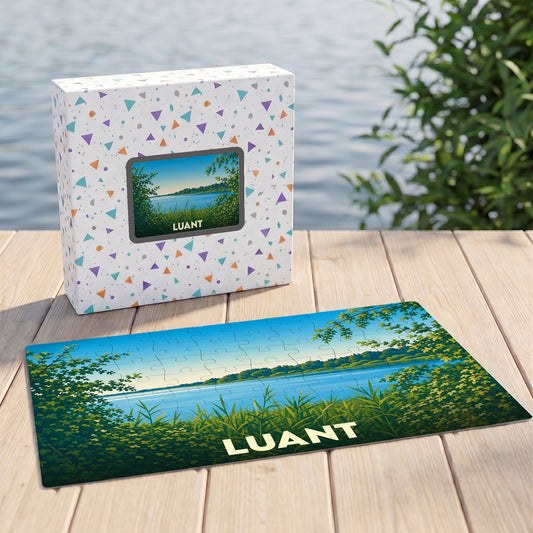 Puzzle souvenir de la ville de Luant avec une illustration stylisée de son paysage lacustre.