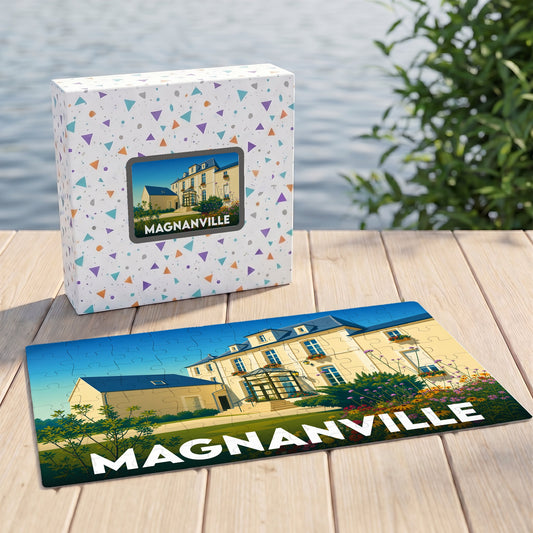 Puzzle souvenir de la ville de Magnanville avec une illustration stylisée d'une grande demeure.